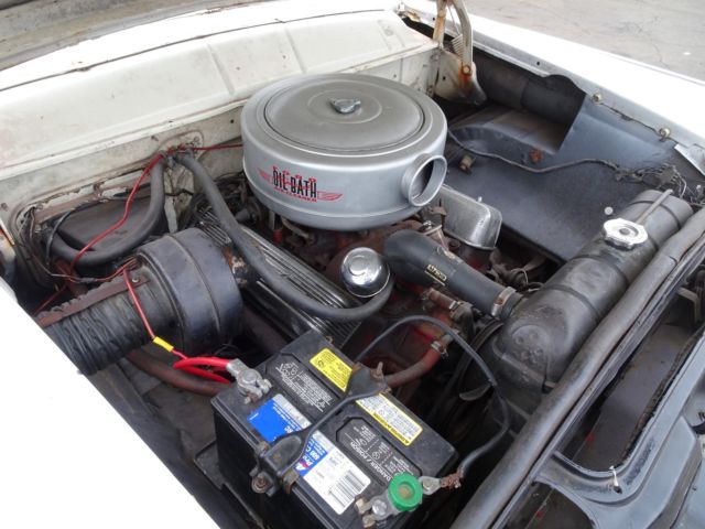 1956 Red Ford Fairlane Coupe