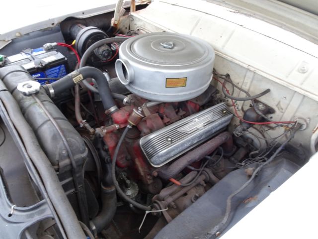 1956 Red Ford Fairlane Coupe