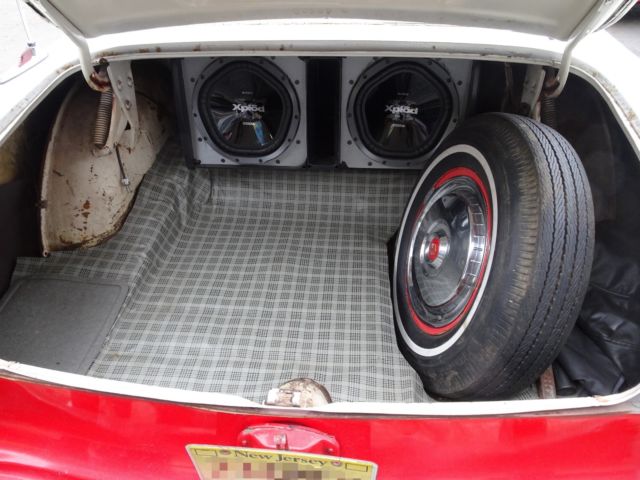 1956 Red Ford Fairlane Coupe
