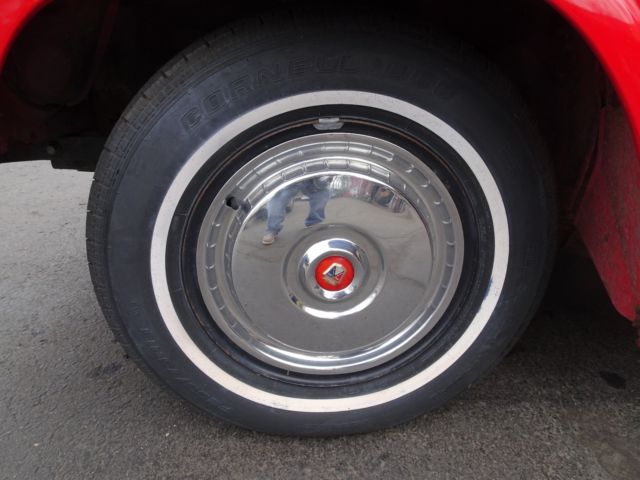 1956 Red Ford Fairlane Coupe