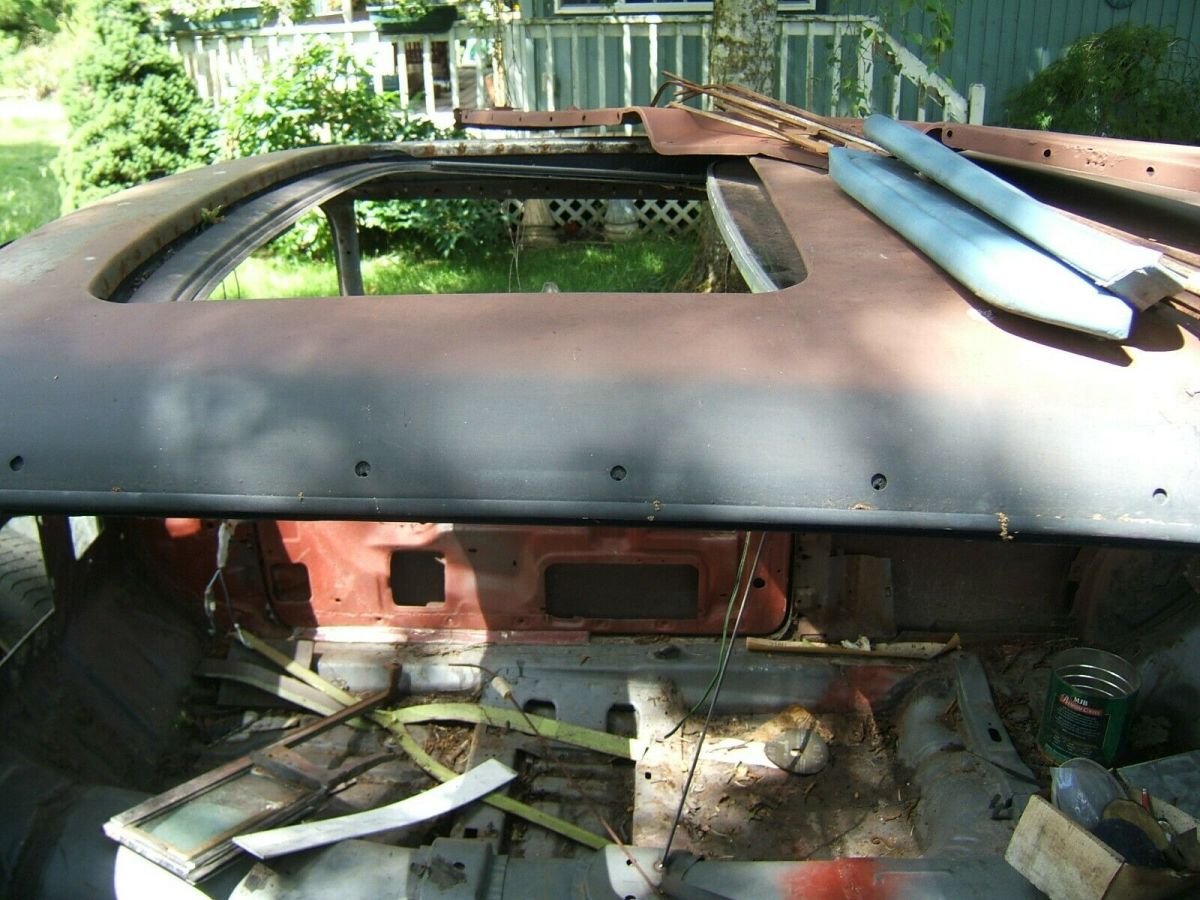 1956 Red Ford Fairlane Coupe