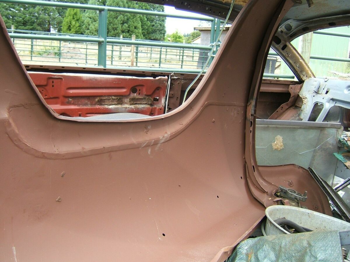 1956 Red Ford Fairlane Coupe