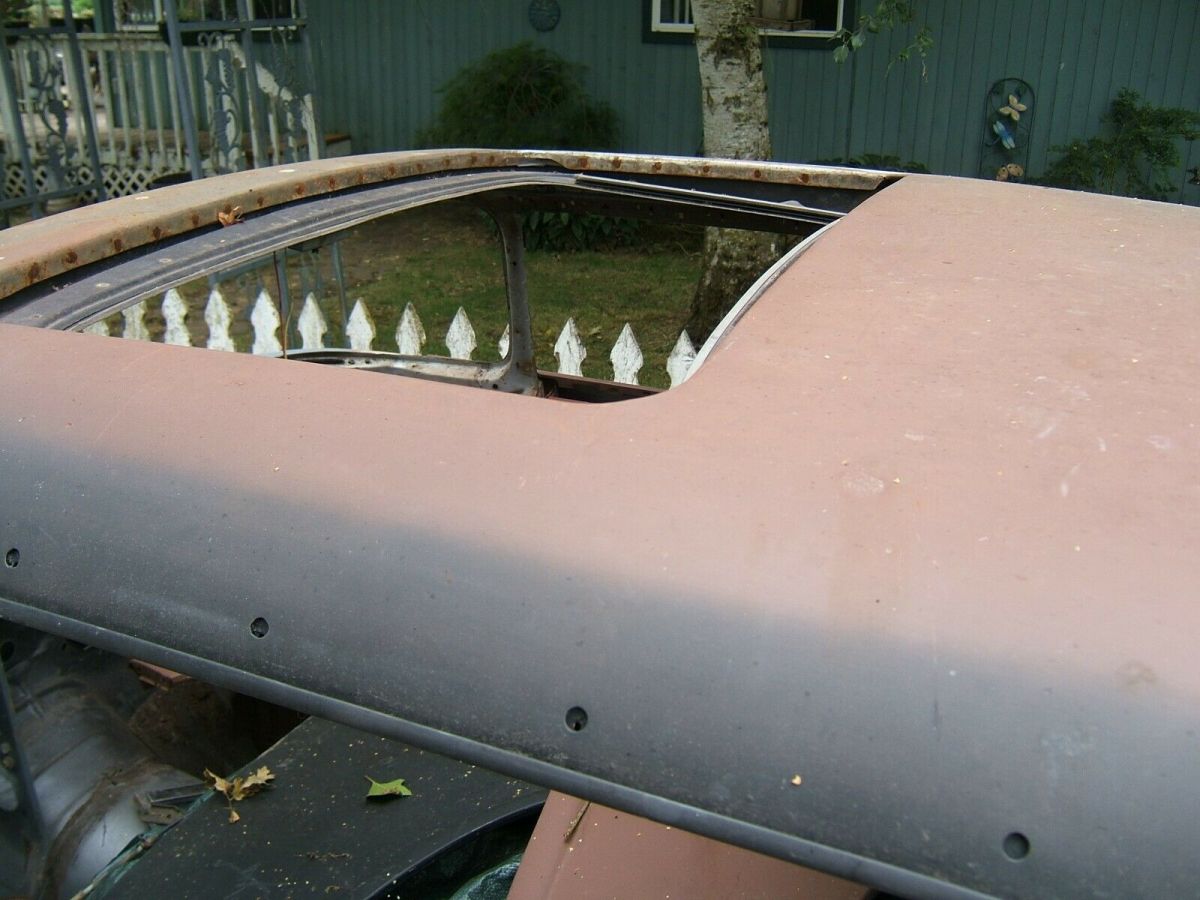 1956 Red Ford Fairlane Coupe