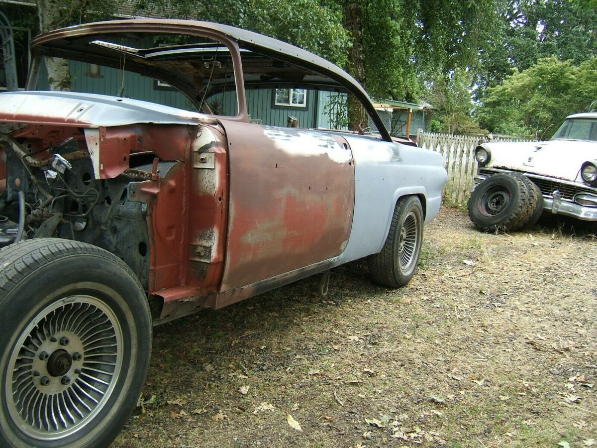 1956 Red Ford Fairlane Coupe