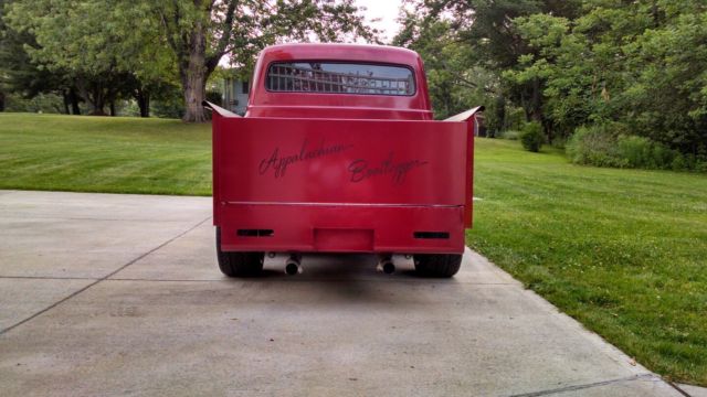 1956 red/black Ford F-100 pickup