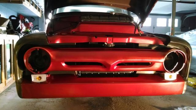 1956 red/black Ford F-100 pickup