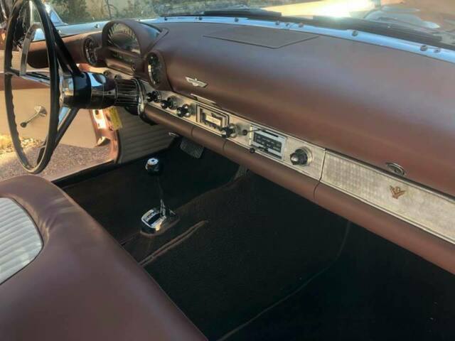 1956 pink Ford Thunderbird Coupe