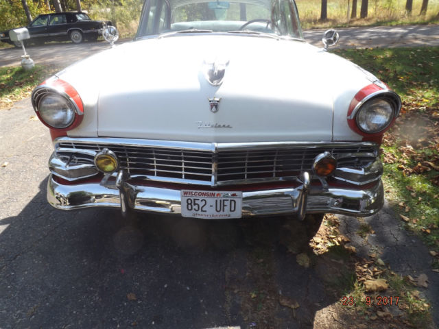 1956 Red/White Ford Fairlane Four door post
