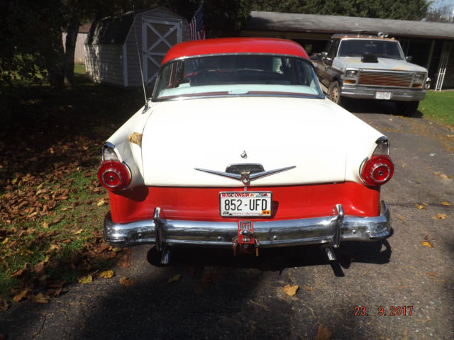 1956 Red/White Ford Fairlane Four door post