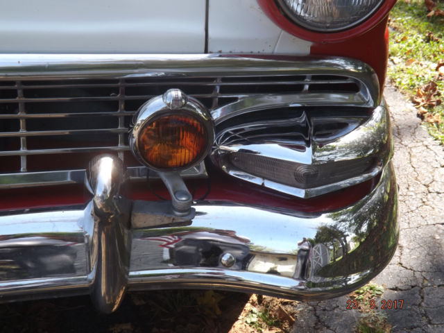 1956 Red/White Ford Fairlane Four door post