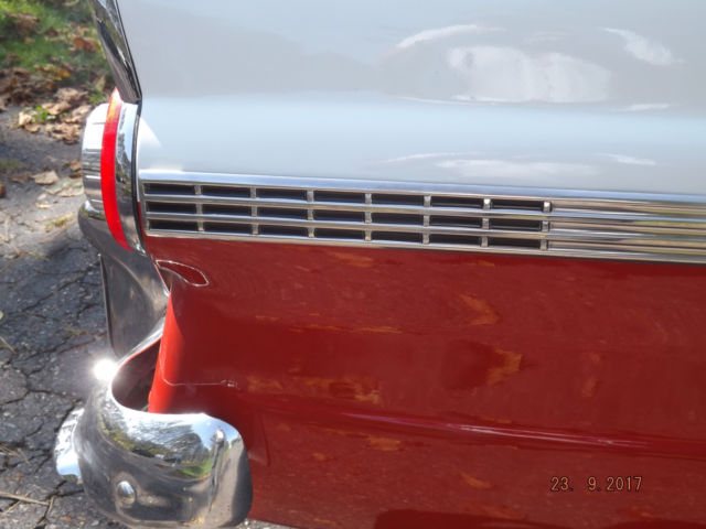 1956 Red/White Ford Fairlane Four door post