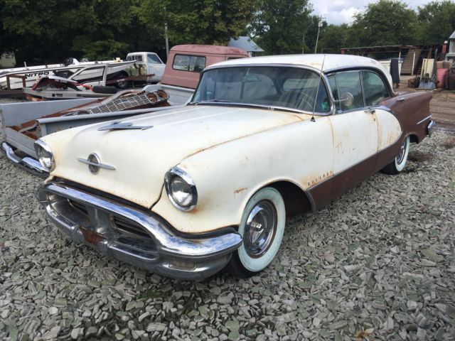 1956 brown/white Oldsmobile Ninety-Eight 4-dr. hardtop