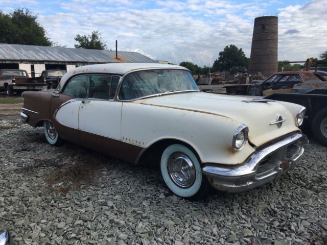 1956 brown/white Oldsmobile Ninety-Eight 4-dr. hardtop