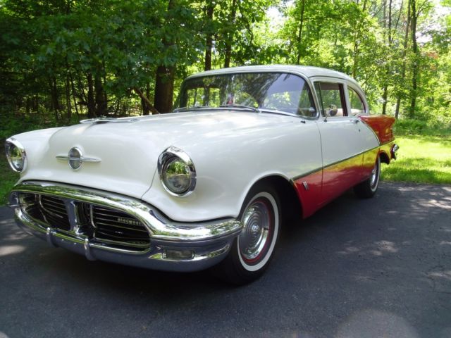 1956 Red/White Oldsmobile Eighty-Eight Sedan