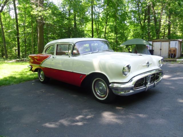 1956 Red/White Oldsmobile Eighty-Eight Sedan