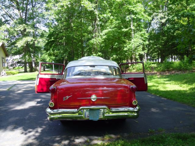 1956 Red/White Oldsmobile Eighty-Eight Sedan