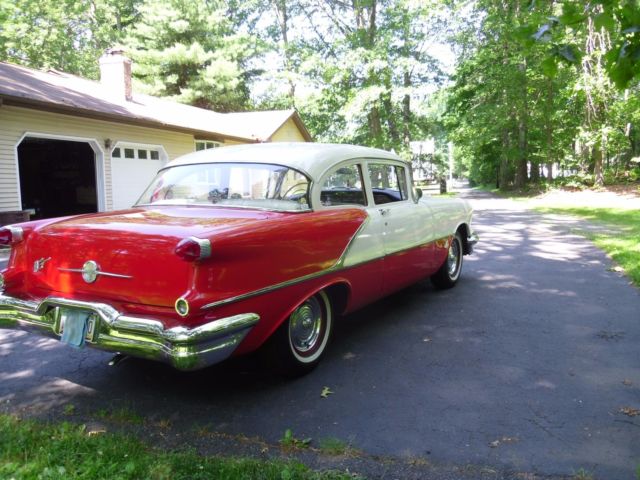 1956 Red/White Oldsmobile Eighty-Eight Sedan