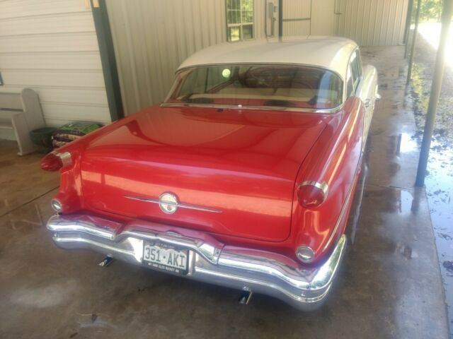 1956 Red Oldsmobile Eighty-Eight Coupe