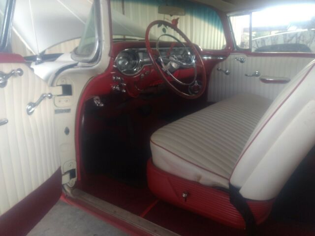 1956 Red Oldsmobile Eighty-Eight Coupe
