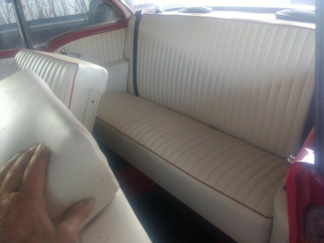 1956 Red Oldsmobile Eighty-Eight Coupe