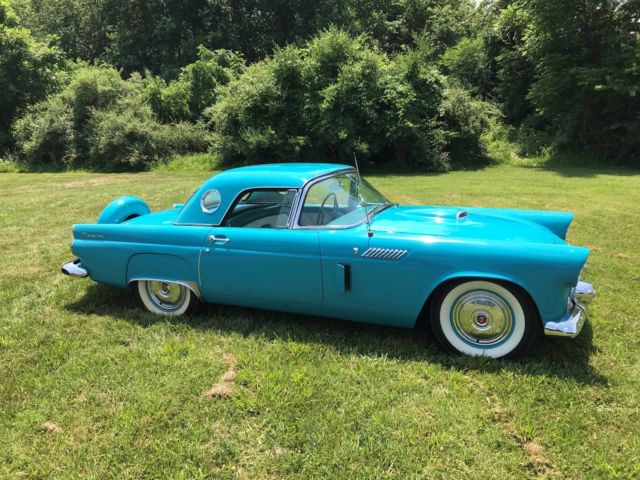1956 Turquise Ford Thunderbird 2 door roadster.