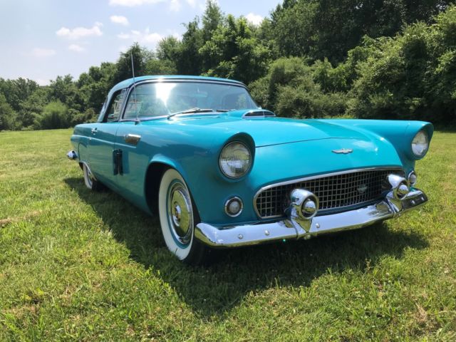 1956 Turquise Ford Thunderbird 2 door roadster.