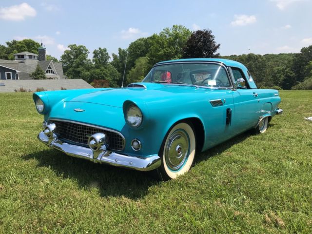 1956 Turquise Ford Thunderbird 2 door roadster.