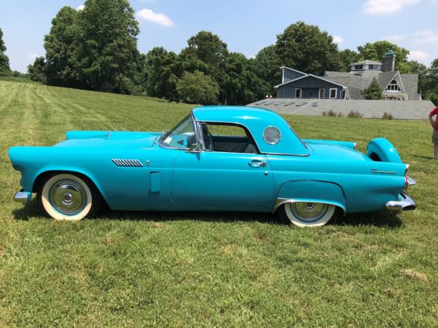 1956 Turquise Ford Thunderbird 2 door roadster.