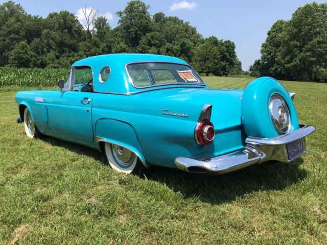 1956 Turquise Ford Thunderbird 2 door roadster.