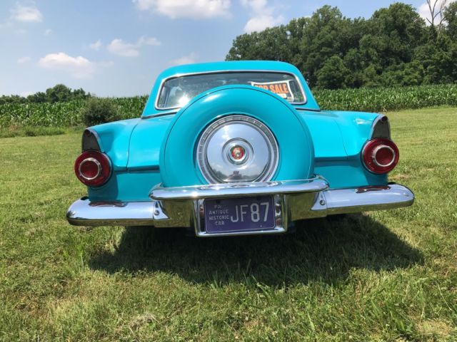 1956 Turquise Ford Thunderbird 2 door roadster.