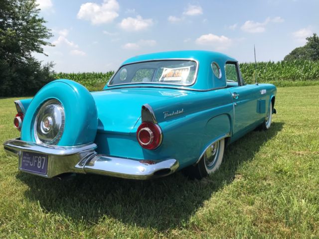 1956 Turquise Ford Thunderbird 2 door roadster.