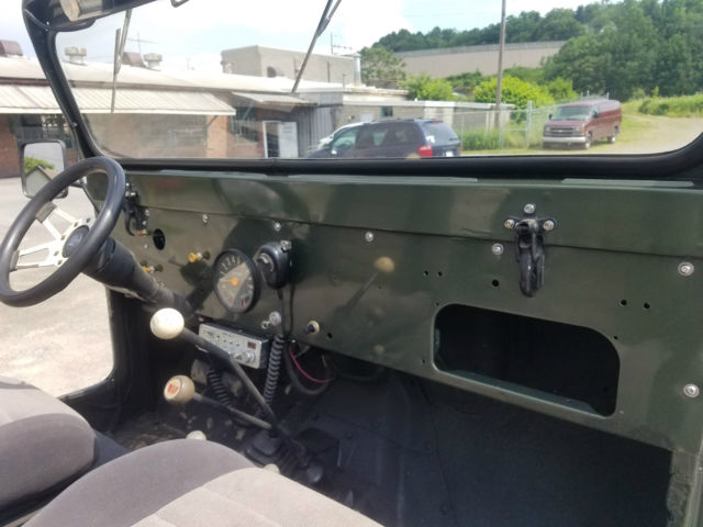 1956 forest green metallic Willys jeep Convertible