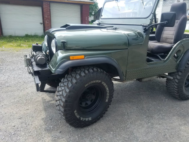 1956 forest green metallic Willys jeep Convertible