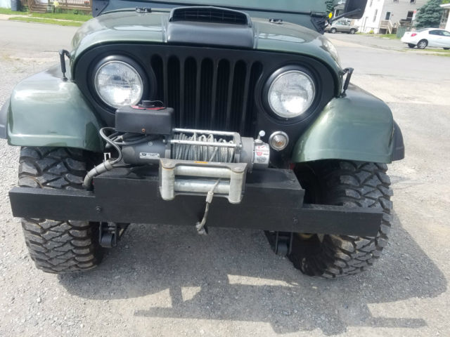 1956 forest green metallic Willys jeep Convertible
