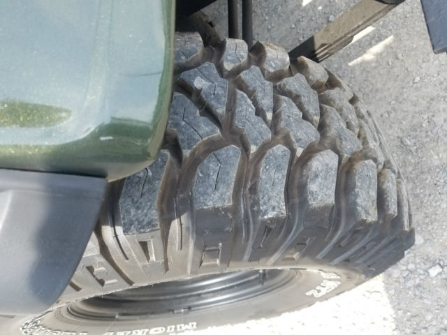 1956 forest green metallic Willys jeep Convertible