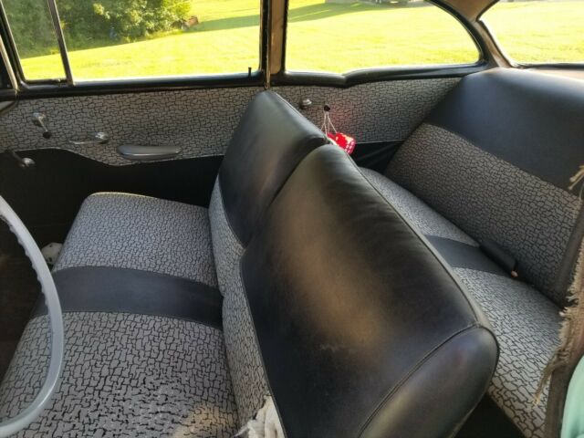 1957 Teal Chevrolet Bel Air/150/210 Sedan