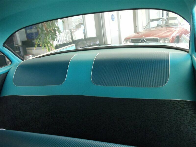 1957 Turquoise and White Chevrolet Bel Air/150/210 Sedan