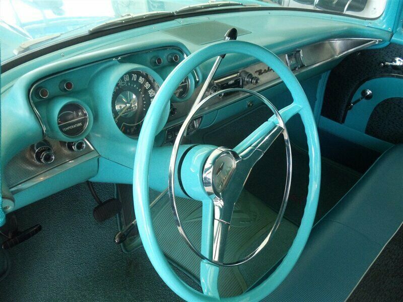 1957 Turquoise and White Chevrolet Bel Air/150/210 Sedan