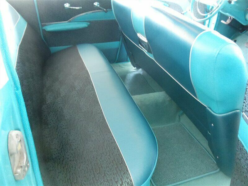 1957 Turquoise and White Chevrolet Bel Air/150/210 Sedan