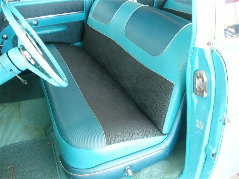 1957 Turquoise and White Chevrolet Bel Air/150/210 Sedan