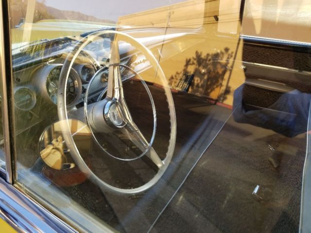 1957 Yellow Chevrolet Bel Air/150/210 Sedan
