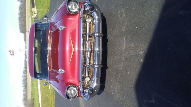 1957 garnet red Chevrolet Bel Air/150/210 Coupe