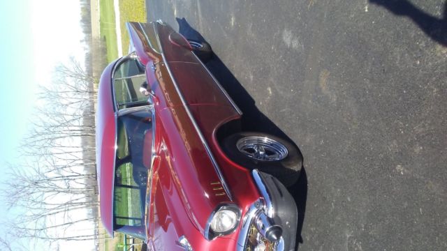 1957 garnet red Chevrolet Bel Air/150/210 Coupe