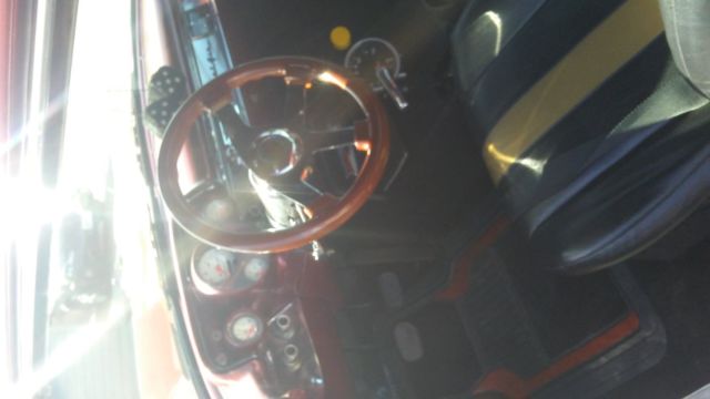 1957 garnet red Chevrolet Bel Air/150/210 Coupe