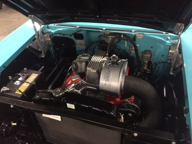 1957 Turquoise Chevrolet Bel Air/150/210