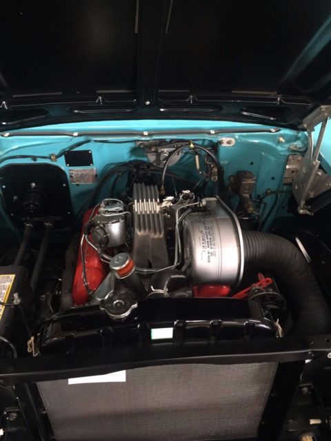 1957 Turquoise Chevrolet Bel Air/150/210