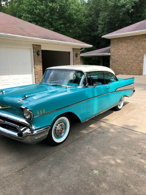 1957 Tropical Turquoise/India Ivory Chevrolet Bel Air/150/210 Coupe