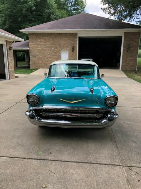 1957 Tropical Turquoise/India Ivory Chevrolet Bel Air/150/210 Coupe