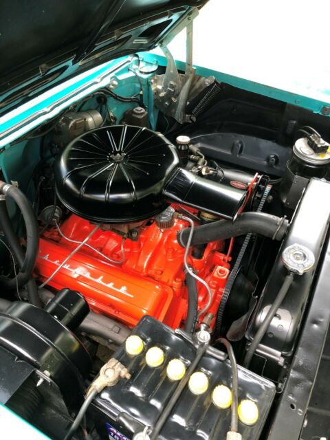 1957 Tropical Turquoise/India Ivory Chevrolet Bel Air/150/210 Coupe