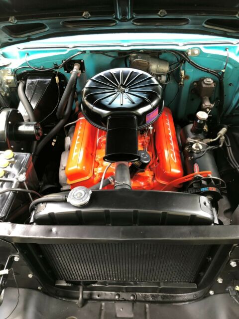 1957 Tropical Turquoise/India Ivory Chevrolet Bel Air/150/210 Coupe